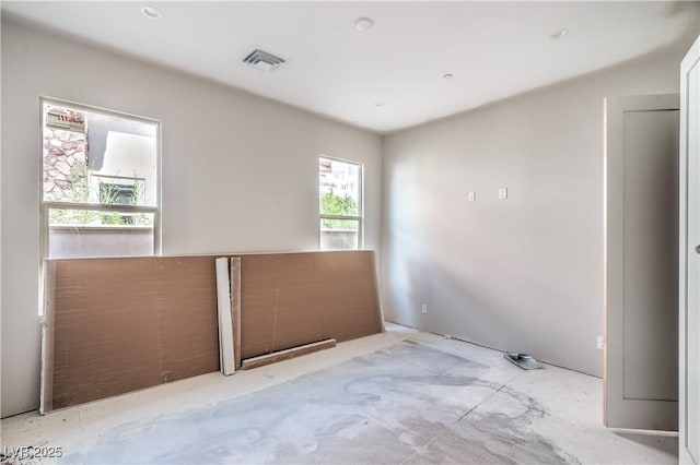 empty room featuring visible vents