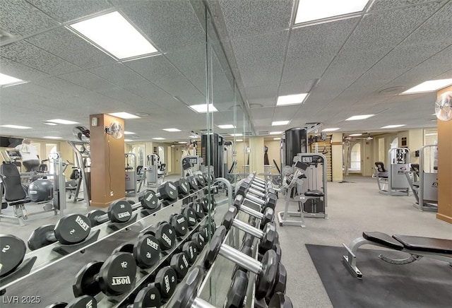 gym featuring a paneled ceiling