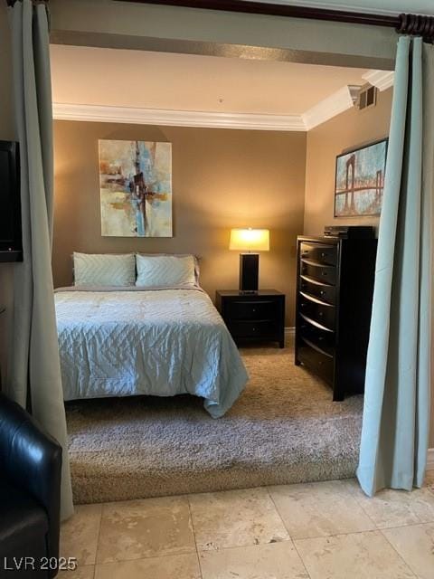 bedroom featuring visible vents and crown molding