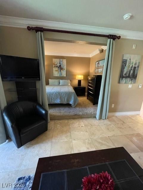 bedroom featuring light tile patterned floors, baseboards, and ornamental molding