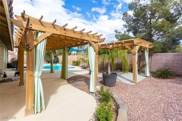 view of patio / terrace with a fenced in pool, a fenced backyard, and a pergola