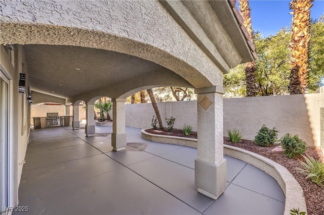 view of patio with a fenced backyard