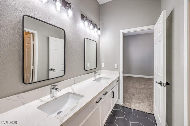 8864 La Manga Ave, Las Vegas, NV 89147 - bathroom with double vanity, tile patterned floors, and a sink