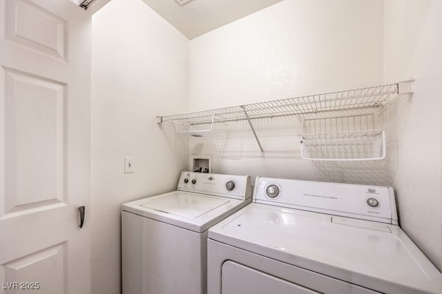 laundry room with laundry area and washing machine and dryer