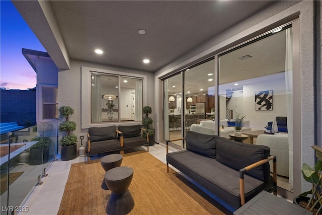 view of patio / terrace with visible vents and an outdoor living space