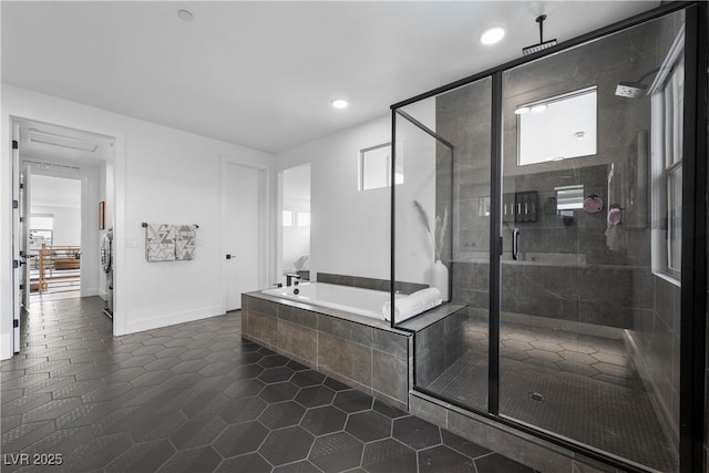 bathroom with baseboards, recessed lighting, tile patterned flooring, a shower stall, and a bath