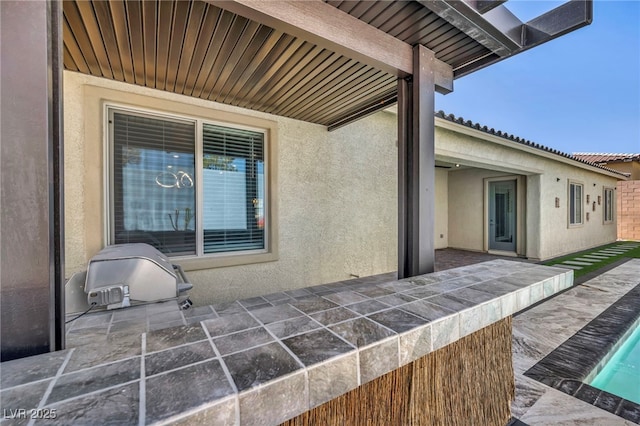 view of patio featuring grilling area