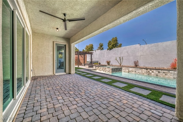 view of patio / terrace featuring a fenced in pool, fence, an in ground hot tub, a pergola, and a ceiling fan