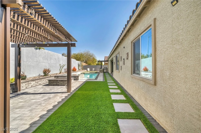 view of yard with a patio, a fenced in pool, a fenced backyard, and a pergola