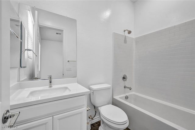 full bathroom with visible vents, tub / shower combination, toilet, and vanity