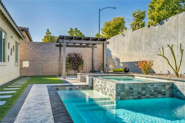 view of swimming pool featuring an in ground hot tub and a fenced backyard