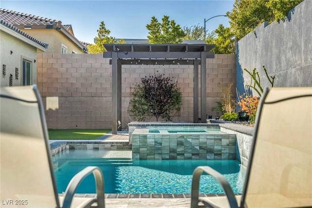 view of swimming pool featuring a fenced in pool, an in ground hot tub, and a fenced backyard