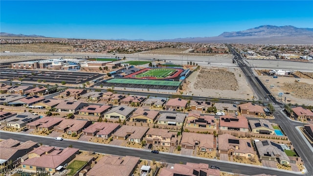 aerial view featuring a mountain view and a residential view