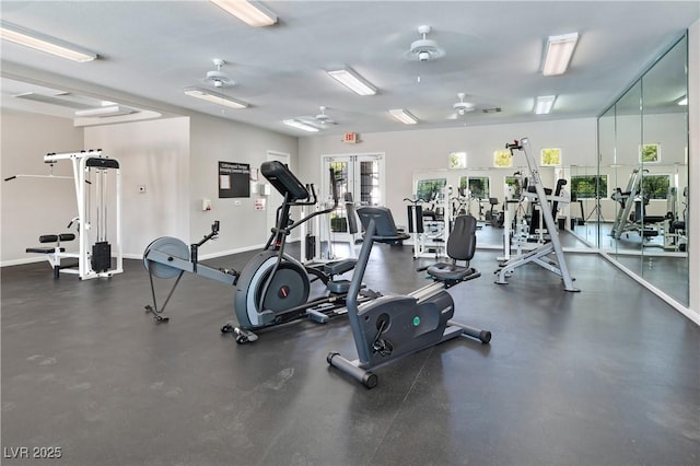 workout area with french doors and baseboards