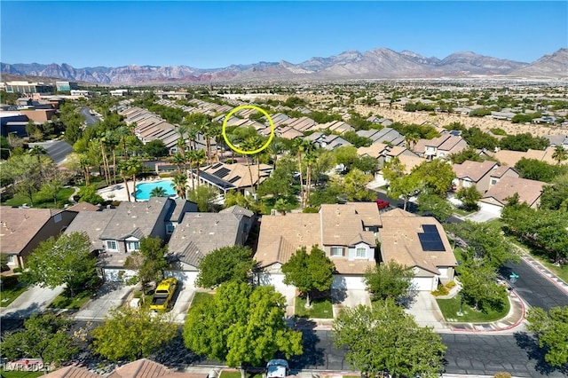 bird's eye view featuring a mountain view and a residential view