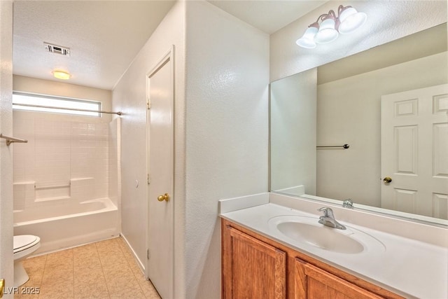 bathroom with visible vents, toilet, a textured ceiling, vanity, and shower / bathtub combination