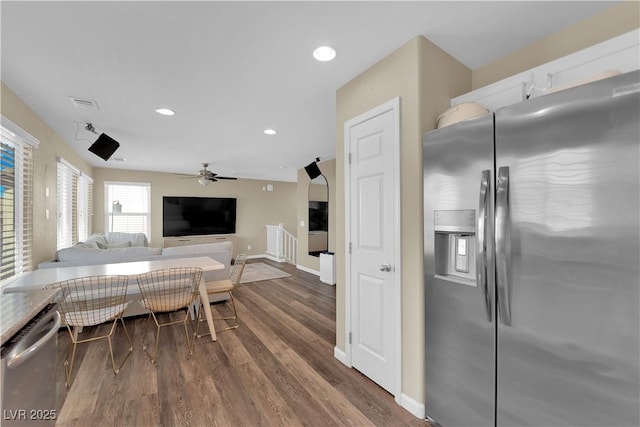 dining space with dark wood finished floors, visible vents, recessed lighting, and baseboards