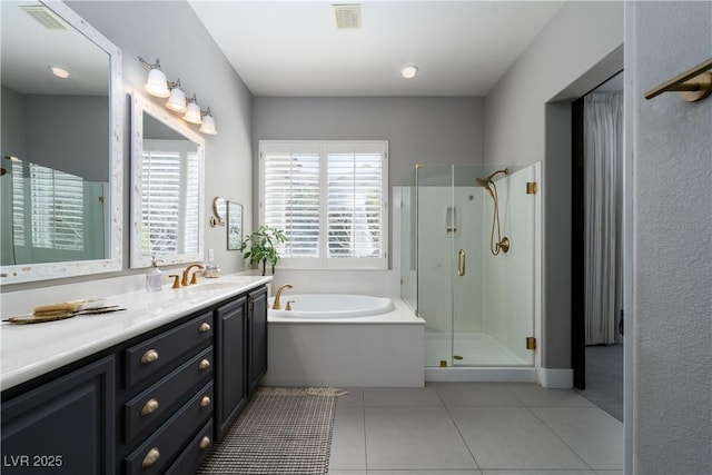 full bath featuring tile patterned floors, visible vents, a stall shower, a bath, and vanity