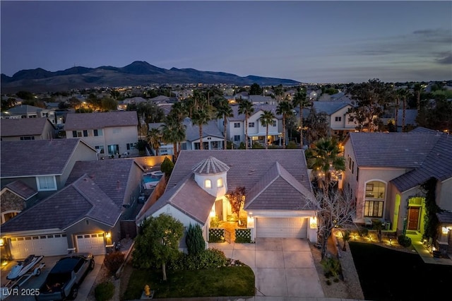 aerial view featuring a mountain view and a residential view