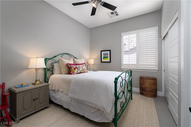 bedroom featuring visible vents, ceiling fan, and baseboards