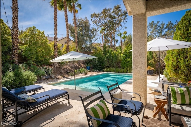 pool featuring a patio area