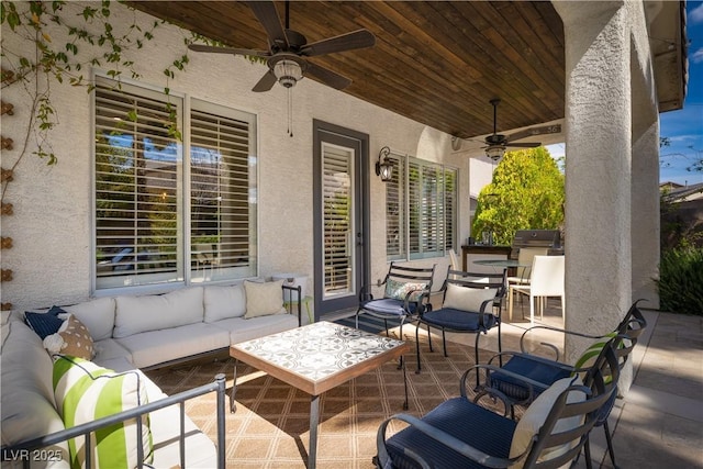 view of patio with outdoor lounge area, outdoor dining area, and a ceiling fan