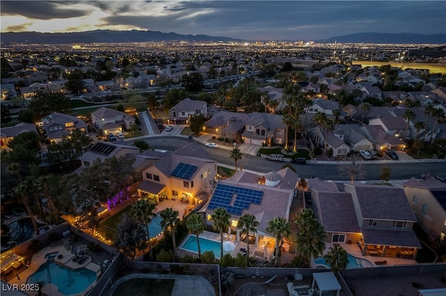 bird's eye view featuring a mountain view and a residential view