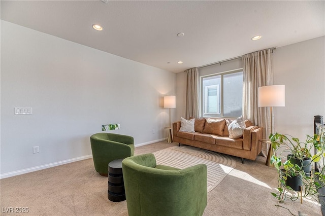 carpeted living room featuring recessed lighting and baseboards