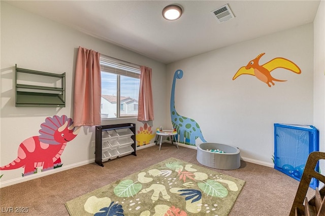 recreation room featuring visible vents, baseboards, and carpet