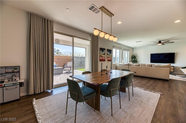 dining area featuring dark wood finished floors, visible vents, recessed lighting, and ceiling fan