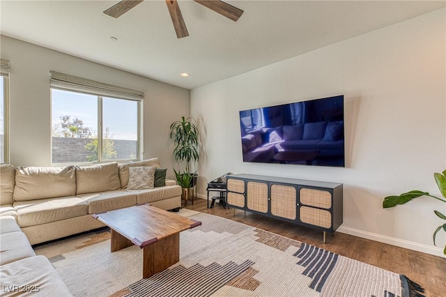 living area featuring recessed lighting, wood finished floors, baseboards, and ceiling fan