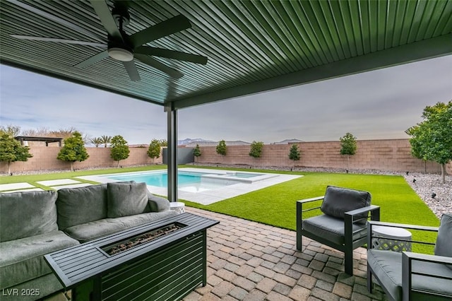 view of patio / terrace featuring ceiling fan, an outdoor hangout area, and a fenced backyard