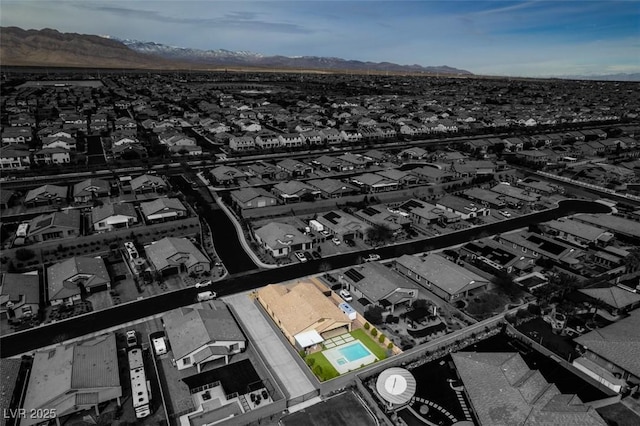 bird's eye view featuring a residential view and a mountain view