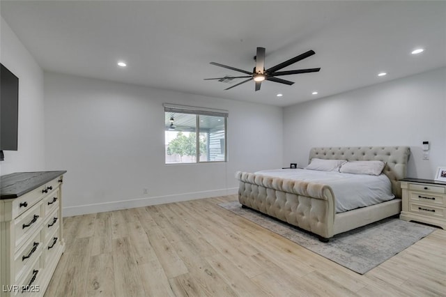 bedroom featuring recessed lighting, baseboards, and light wood-style flooring