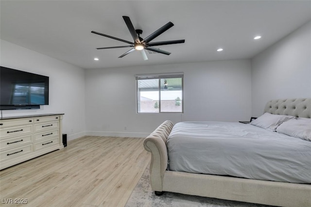 bedroom featuring recessed lighting, light wood-style flooring, baseboards, and ceiling fan