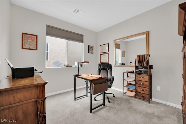 office area with baseboards, visible vents, and carpet floors