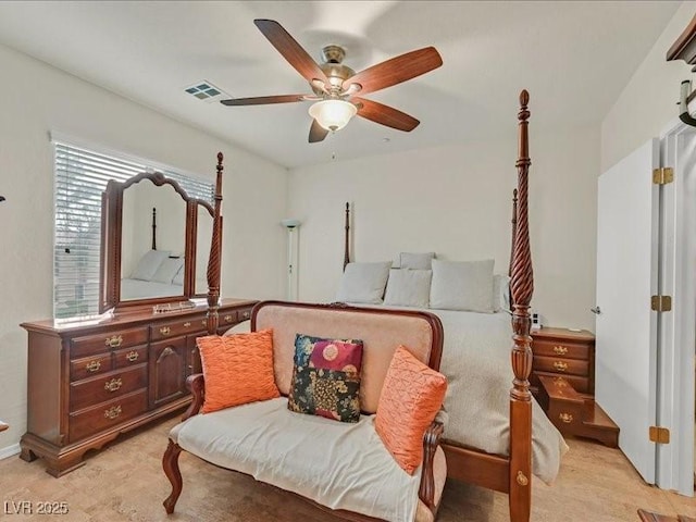 bedroom with visible vents and a ceiling fan