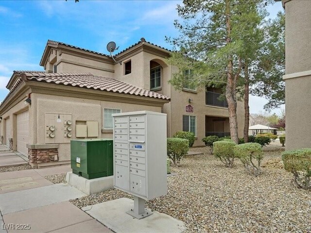 4615 Puglia Ln Unit 201, North Las Vegas, NV 89084 - surrounding community featuring mail area and an attached garage
