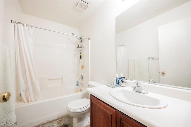 bathroom with visible vents, toilet, vanity, and shower / bath combination with curtain