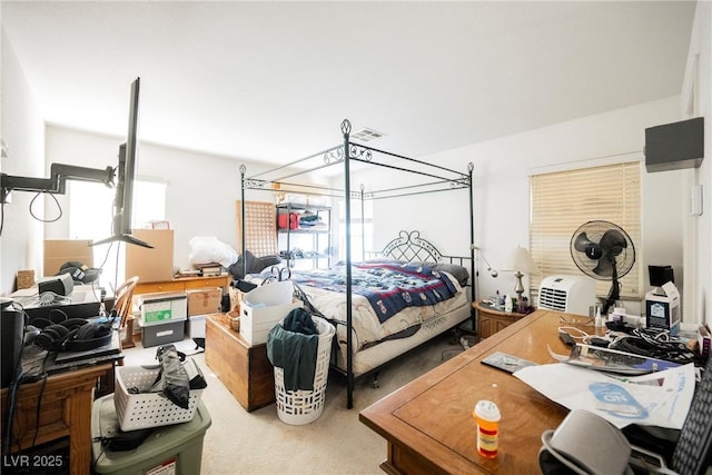 carpeted bedroom with visible vents