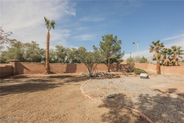 view of yard featuring a fenced backyard