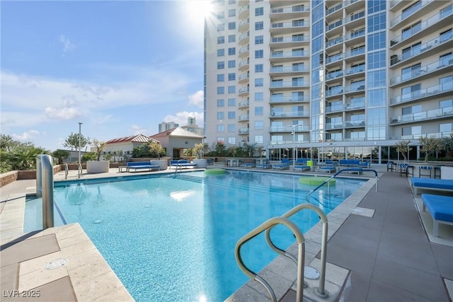 pool featuring a patio area