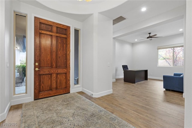 entrance foyer featuring recessed lighting, visible vents, baseboards, and wood finished floors