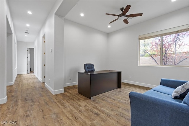 office space featuring recessed lighting, baseboards, wood finished floors, and ceiling fan