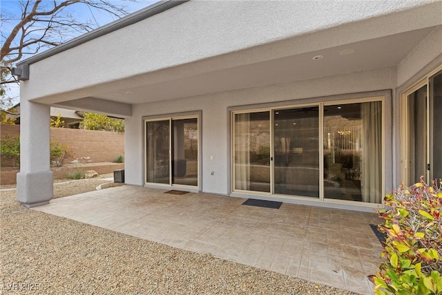 view of patio / terrace featuring fence