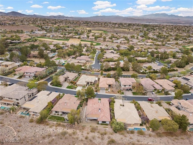 aerial view featuring a mountain view and a residential view