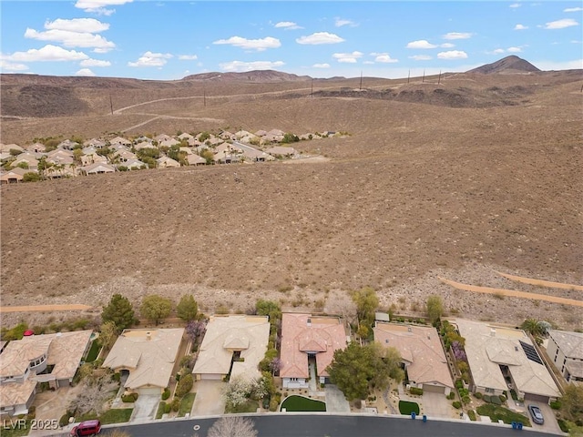 bird's eye view featuring a mountain view and a residential view