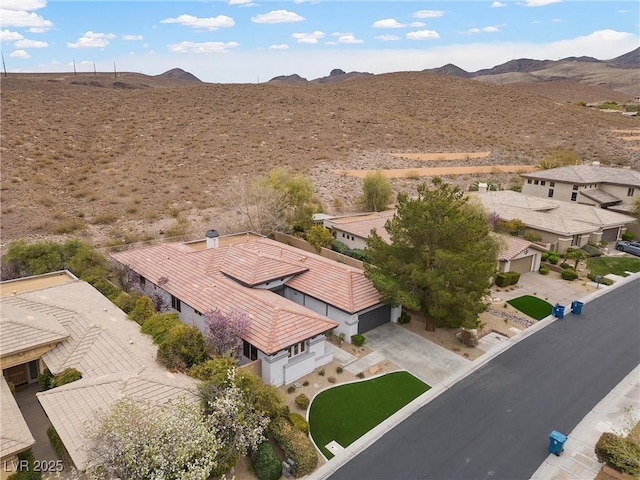 aerial view featuring a mountain view and a residential view