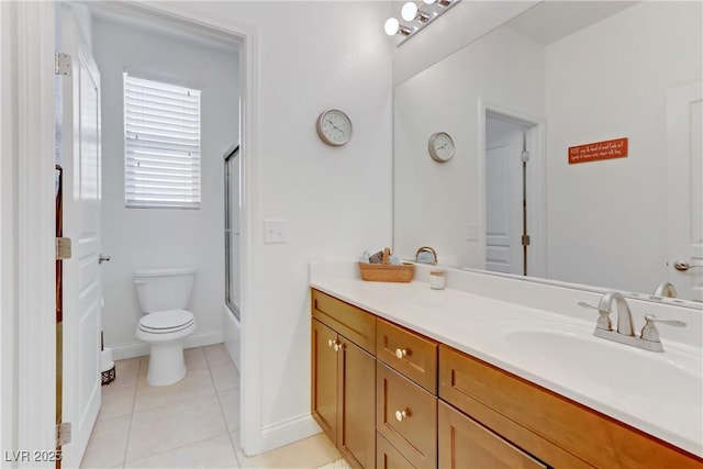 full bathroom featuring tile patterned floors, toilet, baseboards, bath / shower combo with glass door, and vanity