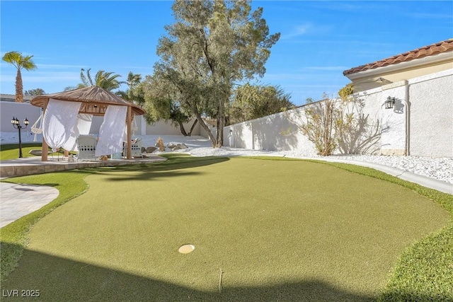 view of yard with a fenced backyard